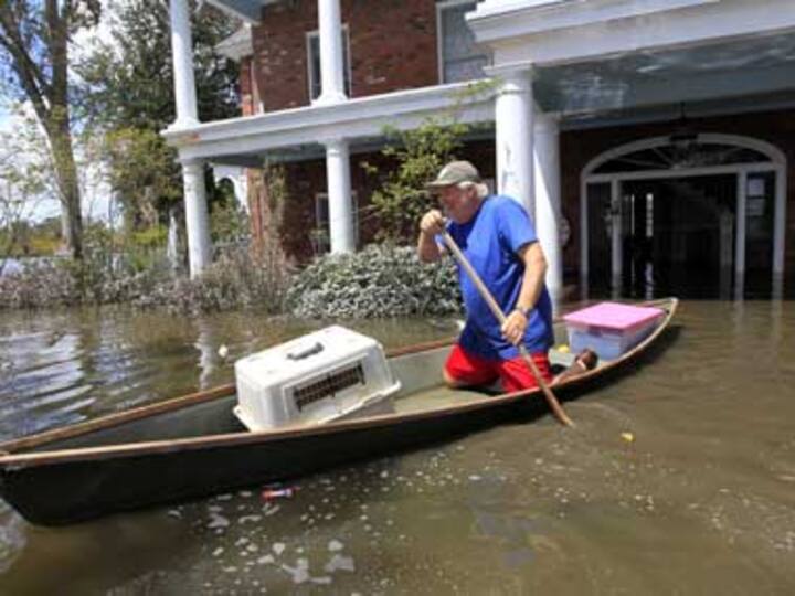 Days after Isaac, flooding and outages remain