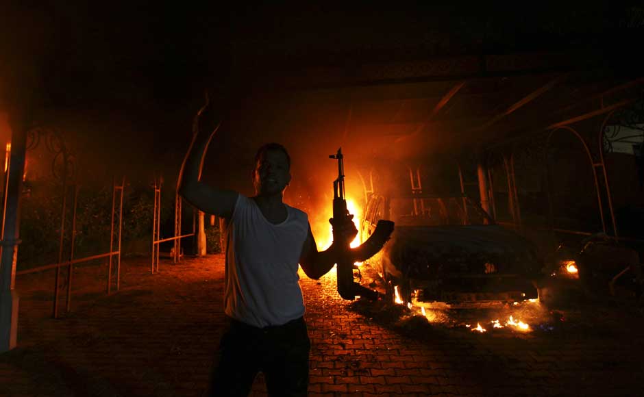 <br />A protester reacts as the US Consulate in Benghazi is seen in flames during a protest by an armed group said to have been protesting a film being produced in the United States on 11 September 2012. US Ambassador to Libya J Christopher Stevens and three other staff members perished in the rocket attack, Libyan security sources said on Wednesday. Esam Al-Fetori/Reuters <br />A protester reacts as the US Consulate in Benghazi is seen in flames during a protest by an armed group said to have been protesting a film being produced in the United States on 11 September 2012. US Ambassador to Libya J Christopher Stevens and three other staff members perished in the rocket attack, Libyan security sources said on Wednesday. Esam Al-Fetori/Reuters