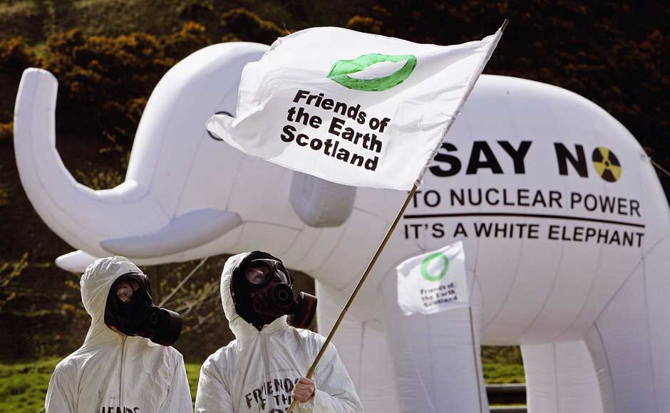 <br />Members of 'Friends of the Earth Scotland', are seen wearing gas masks in front of a inflatable white elephant during a anti nuclear protest at the Scottish Parliament on 26 April 2006 in Edinburgh, Scotland. Jeff J Mitchell/Getty Images <br />Members of 'Friends of the Earth Scotland', are seen wearing gas masks in front of a inflatable white elephant during a anti nuclear protest at the Scottish Parliament on 26 April 2006 in Edinburgh, Scotland. Jeff J Mitchell/Getty Images