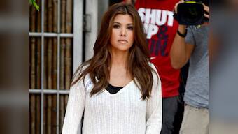 Kourtney Kardashian flashes derriere