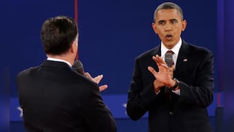 Images: Obama, Romney get aggressive in finger-pointing debate 