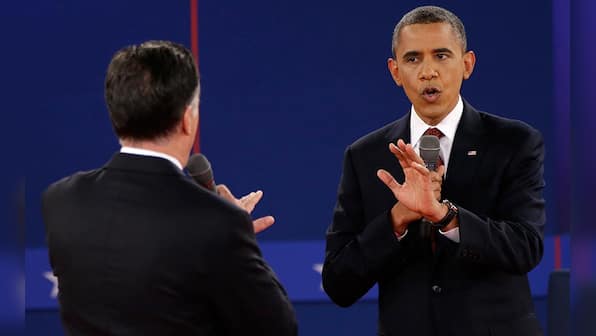 Images: Obama, Romney get aggressive in finger-pointing debate 