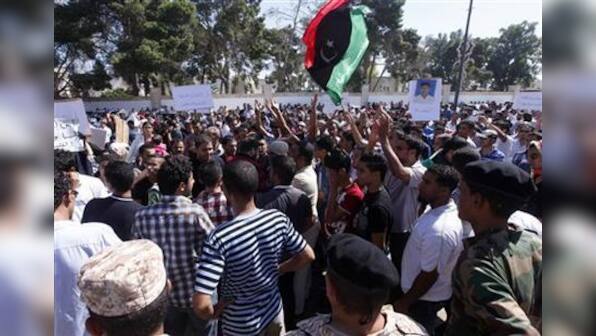 Libya's Bani Walid is shelled in standoff over rebel's death