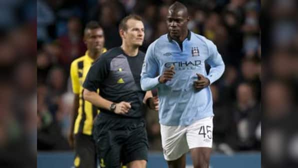 Champions League: Dortmund hold City to draw, Arsenal win 