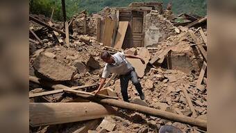 China landslide topples school, buries 18 students 