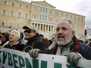 Thousands protest Merkel's Greece visit Thousands protest Merkel's Greece visit