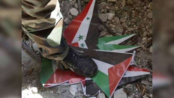 Syria opposition softens stance on role of Assad's party 