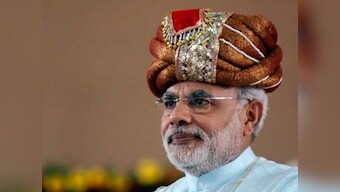 UK changes policy on Gujarat, Modi thanks God