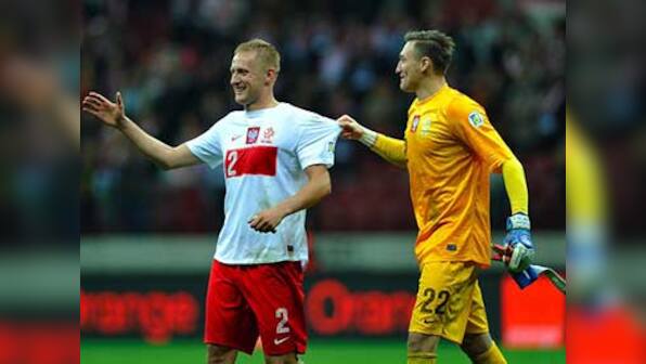Poland hold England to draw in World Cup qualifier