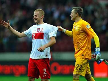 Poland hold England to draw in World Cup qualifier