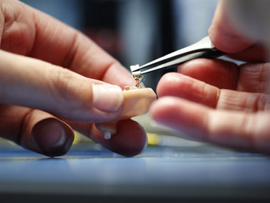 Hearing aid to wear on your teeth Hearing aid to wear on your teeth