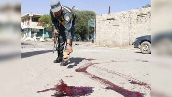 Taliban suicide trucks strike Afghan govt HQ in east, 12 killed