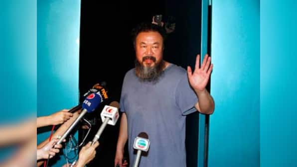 China artist Ai Weiwei dances to Gangnam Style with handcuffs