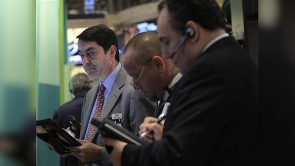 Dow, S&P end flat; Yahoo gains after the bell