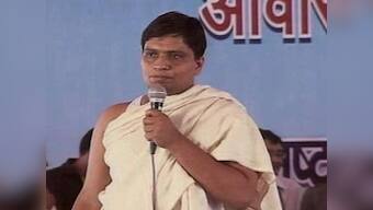 Ramdev aide Balkrishna in court in forgery case