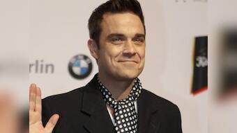 Robbie Williams faithful to wife because he doesn't drink