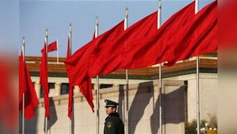 Chinese police plan to board vessels in disputed seas