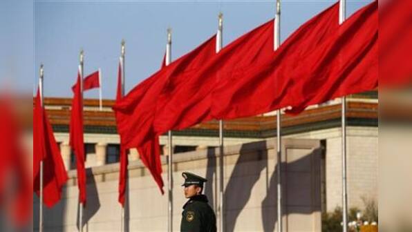 Chinese police plan to board vessels in disputed seas