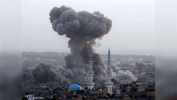 Gaza: Israeli air strikes kill 14 as Hamas rockets pound Jerusalem, Tel Aviv