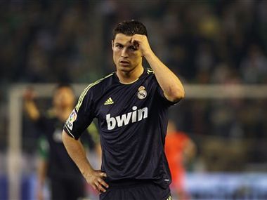 Cristiano Ronaldo of Real Madrid scratches his head during the