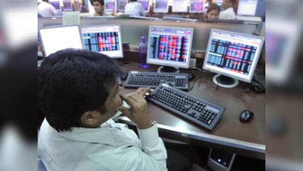 Sensex in green on continuing QE hopes; Hindalco up