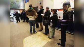 Storm-weary voters in US Northeast face delays, confusion