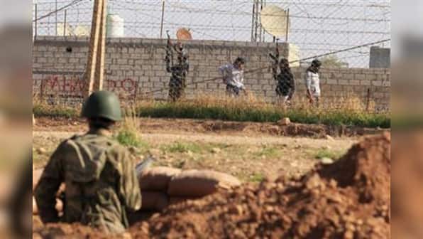 On Syrian border, mixed feelings for rebel 'liberators'