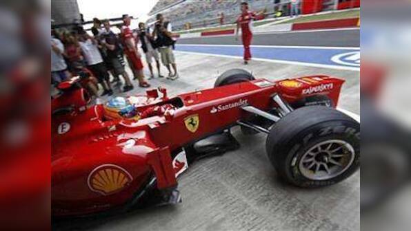 Ferrari break F1 curfew to help Alonso