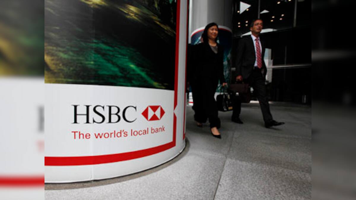 HSBC profit hit by $800m charge for US fine, cuts 30,000 jobs – Firstpost