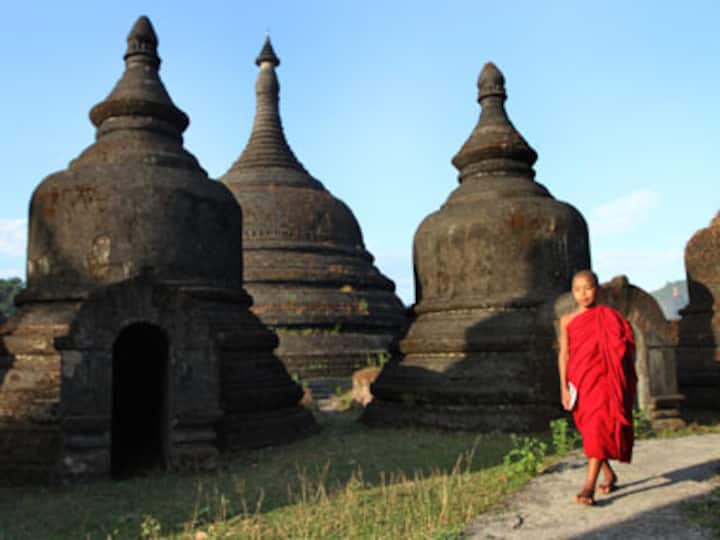 Tourists troop back to violence-torn West Myanmar