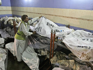 More than a month after Pak factory fire, families wait for bodies of kin More than a month after Pak factory fire, families wait for bodies of kin