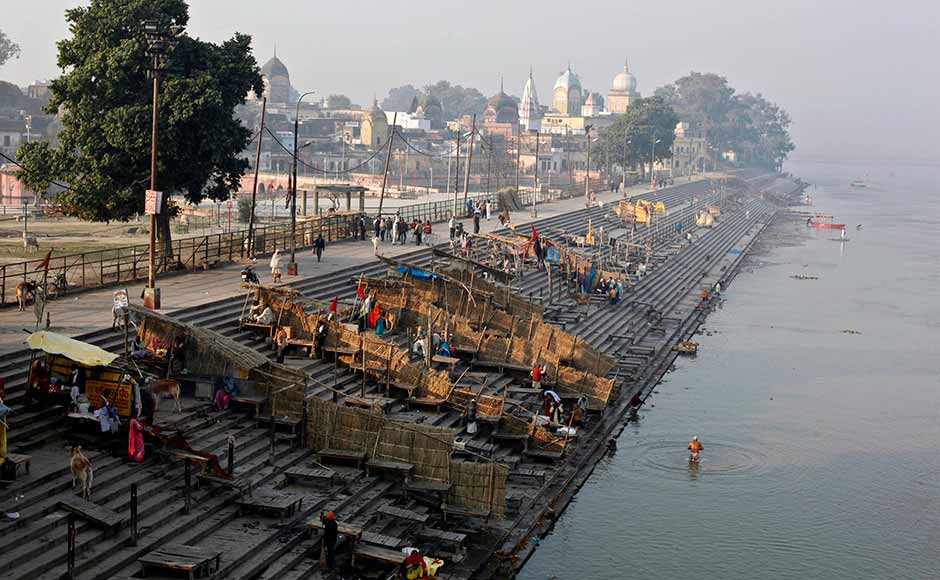 Hindus offer prayers after bathing in the Saryu River on the eve of the anniversary of the Babri mosque demolition in Ayodhya. Rajesh Kumar Singh/AP Hindus offer prayers after bathing in the Saryu River on the eve of the anniversary of the Babri mosque demolition in Ayodhya. Rajesh Kumar Singh/AP