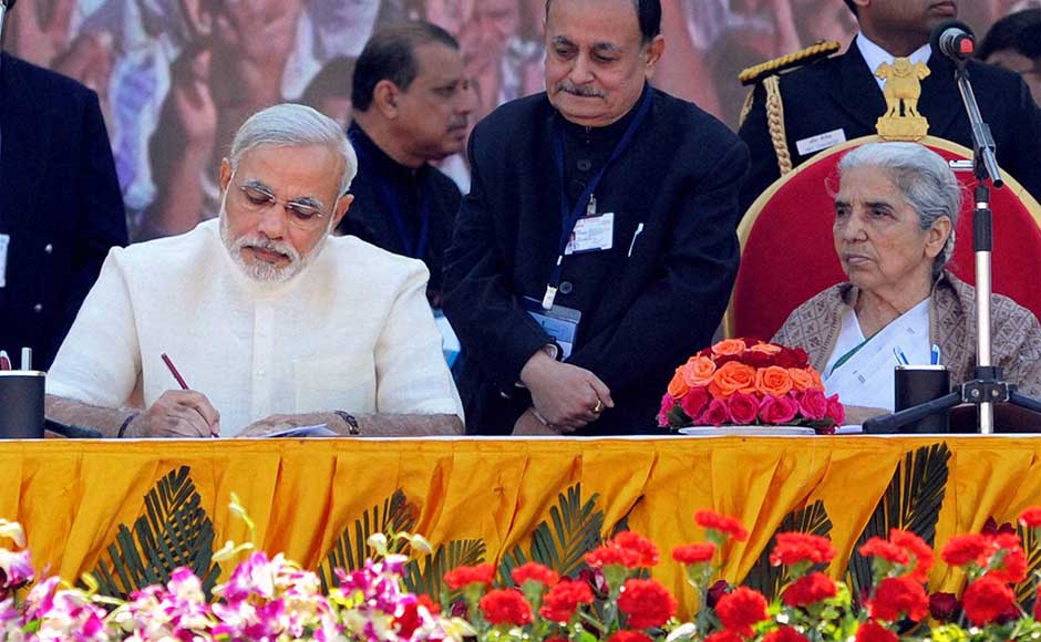 Gujarat Governor Kamla Beniwal (right) and Chief Minister Narendra Modi at the latter's swearing-in ceremony at Sardar Patel Stadium in Ahmedabad. PTI Gujarat Governor Kamla Beniwal (right) and Chief Minister Narendra Modi at the latter's swearing-in ceremony at Sardar Patel Stadium in Ahmedabad. PTI