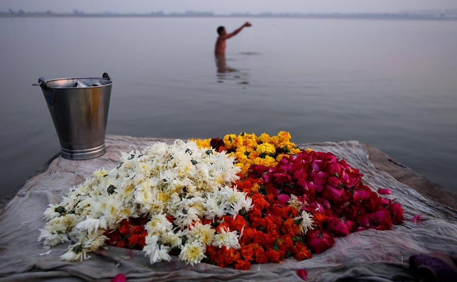 A Hindu man prays after bathing in the Saryu River on the eve of the anniversary of the Babri mosque demolition in Ayodhya. Rajesh Kumar Singh/AP A Hindu man prays after bathing in the Saryu River on the eve of the anniversary of the Babri mosque demolition in Ayodhya. Rajesh Kumar Singh/AP