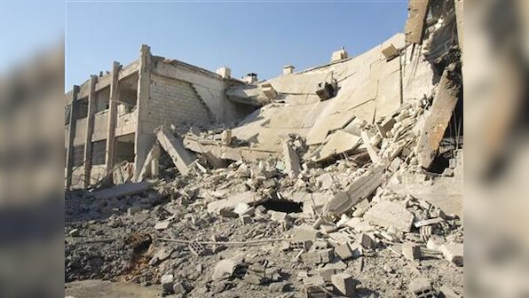 Syrian army pounds rebel strongholds around capital