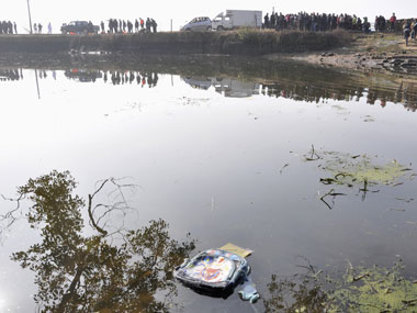 Van crashes into pond killing 11 children in China Van crashes into pond killing 11 children in China