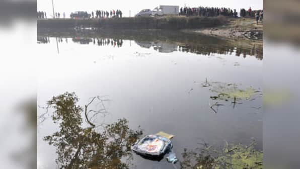 Van crashes into pond killing 11 children in China
