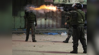 Palestinian youths clash with Israeli soldiers in Hebron
