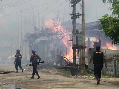 Clashes in Myanmar: 71 killed amid fresh violence as Rohingya militants surround Rakhine state's border post Clashes in Myanmar: 71 killed amid fresh violence as Rohingya militants surround Rakhine state's border post