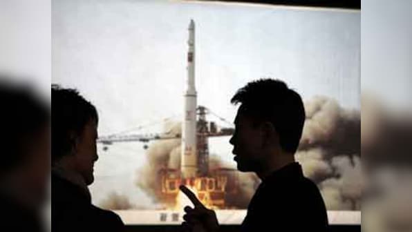 Why now? North Korea's rocket launch is both warning and celebration
