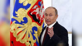 Putin signs law preventing Americans from adopting Russian children 