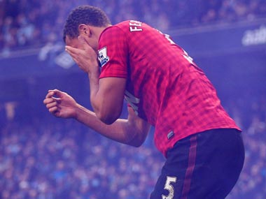 Manchester derby: Ferdinand left bleeding after being hit by coin Manchester derby: Ferdinand left bleeding after being hit by coin