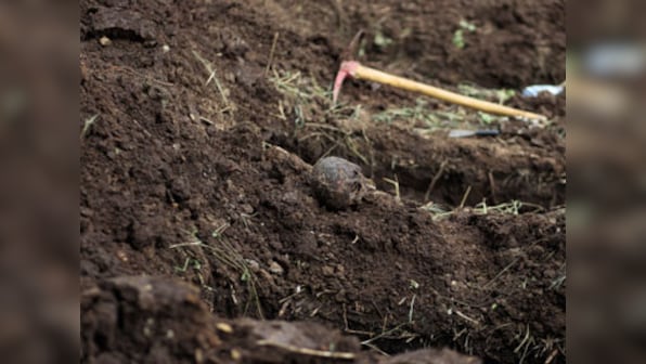 Mass grave containing remains of over 75 civilians and security personnel unearthed in Iraq's Kirkuk province