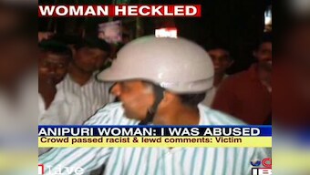 Cops harass woman after accident, gets heckled by mob
