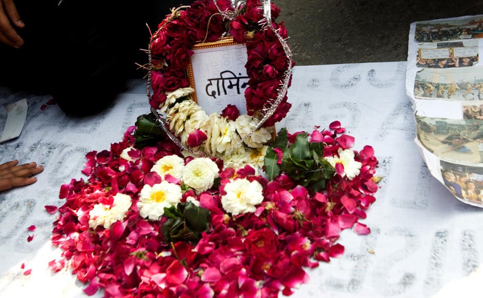 A bed of flowers was erected in the protest site to pay homage to the gangrape survivor's grit and courage. Naresh Sharma/Firstpost A bed of flowers was erected in the protest site to pay homage to the gangrape survivor's grit and courage. Naresh Sharma/Firstpost