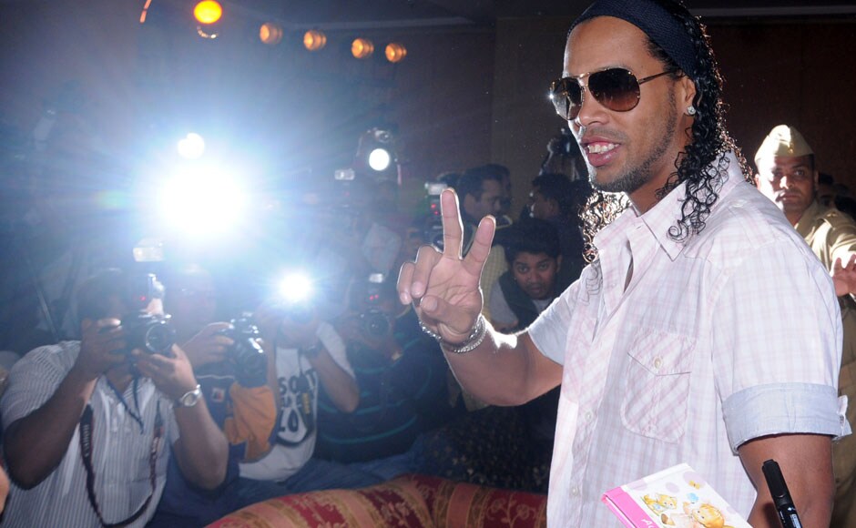 Ronaldinho poses for the cameras. Sachin Gokhale/Firstpost. Ronaldinho poses for the cameras. Sachin Gokhale/Firstpost.