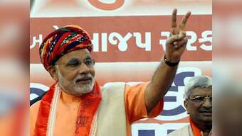  Modi to be sworn in as chief minister on 26 Dec