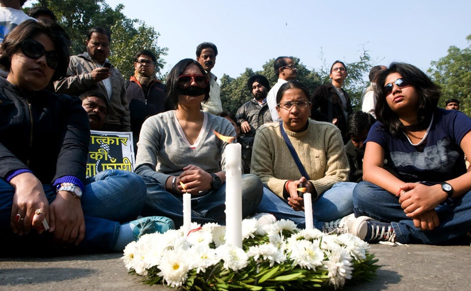 Women wear black bands on their mouth and sit in silent protest near Jantar Mantar. Naresh Sharma/Firstpost Women wear black bands on their mouth and sit in silent protest near Jantar Mantar. Naresh Sharma/Firstpost