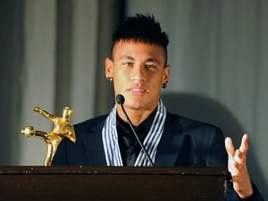 Brazilian football player Neymar speaks after receiving the best South American football player award by Uruguayan newspaper El Pais. AFP