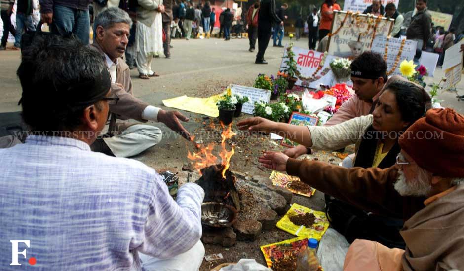 People performing rituals and offering prayers for the Delhi gangrape victim who died on 29 December. Naresh Sharma/Firstpost People performing rituals and offering prayers for the Delhi gangrape victim who died on 29 December. Naresh Sharma/Firstpost
